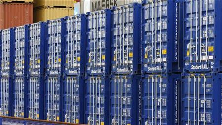 Shipping containers stand in a transport yard near Liverpool