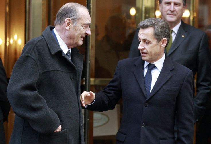 France&#039;s President Nicolas Sarkozy shakes hands with former president Jacques Chirac after lunch at Hotel in Paris