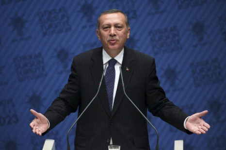 Turkish Prime Minister Erdogan addresses the media at his ruling AKP headquarters in Ankara