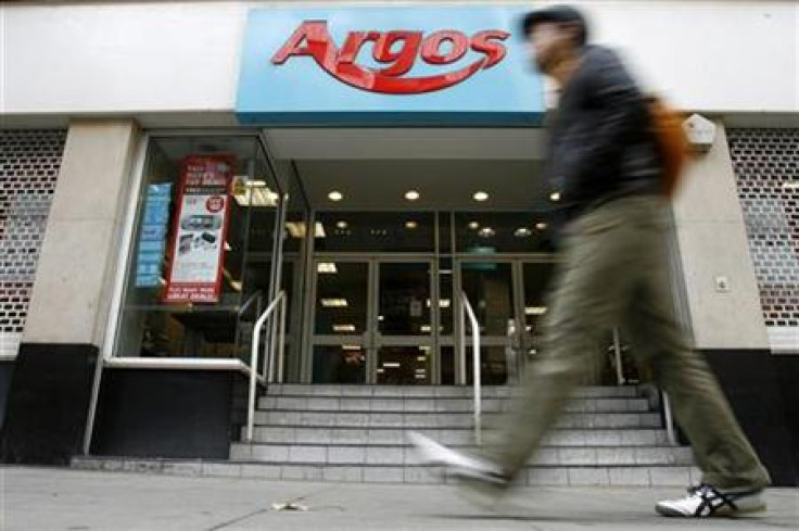 A pedestrian passes a branch of Argos in, central London