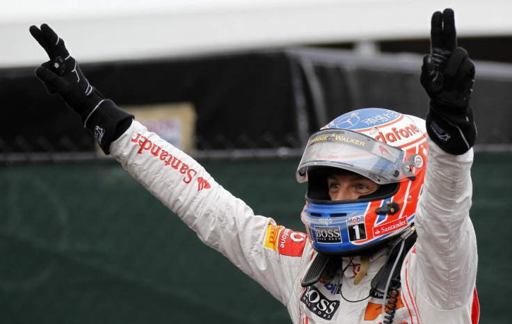 McLaren Formula One driver Jenson Button of Britain celebrates after winning the Canadian F1 Grand Prix at the Circuit Gilles Villeneuve in Montreal.