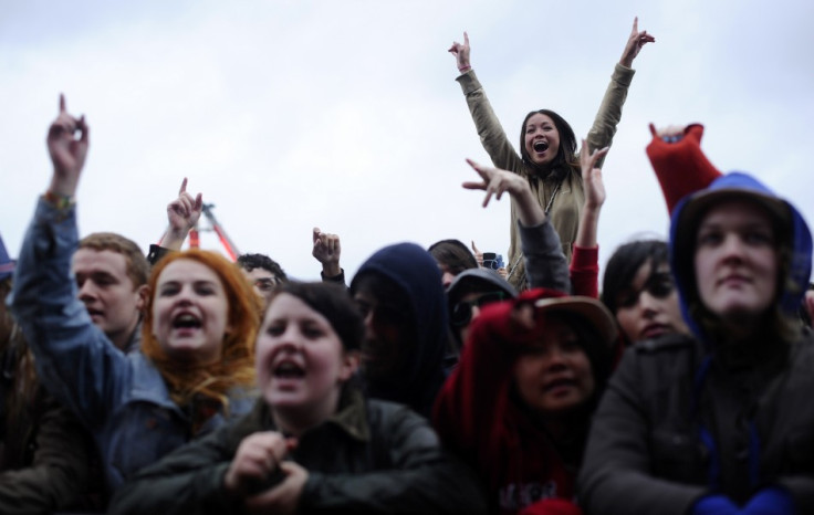 Revellers enjoy the live music as they brave the rain during &quot;Get Loaded in the Park&quot;, a festival at Clapham Common, in London