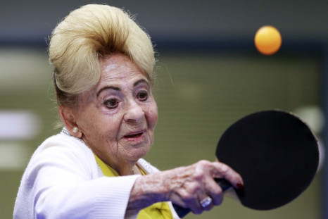 A holocaust survivor plays ping pong at a program for people with Alzheimer's and dementia in Los Angeles