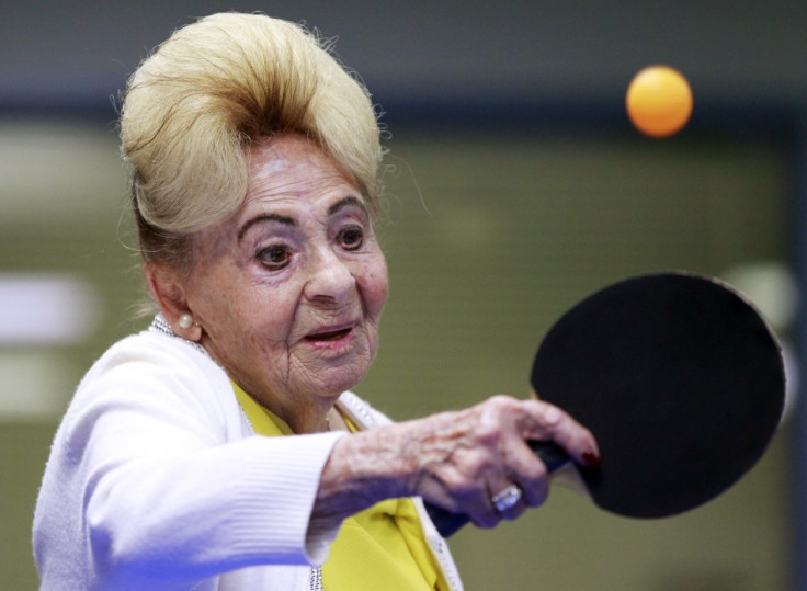 A holocaust survivor plays ping pong at a program for people with Alzheimer&#039;s and dementia in Los Angeles