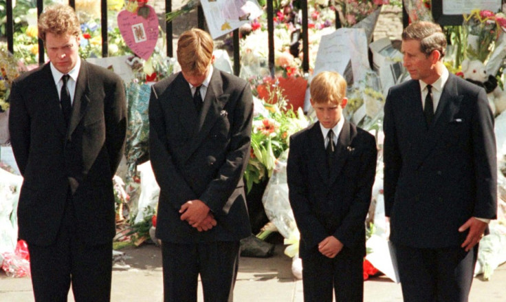 Earl Spencer (L) Prince William (2nd L) , Prince Harry and Prince Charles (R) watch as the coffin of Diana, Princess of Wales is driven away in a hearse from Westminster Abbey following her funeral service September 6, 2007.