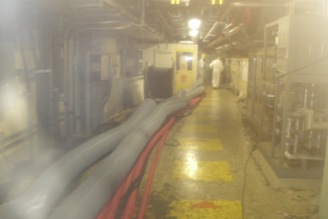 Workers walking inside Tokyo Electric Power Co.(TEPCO)'s Fukushima Daiichi