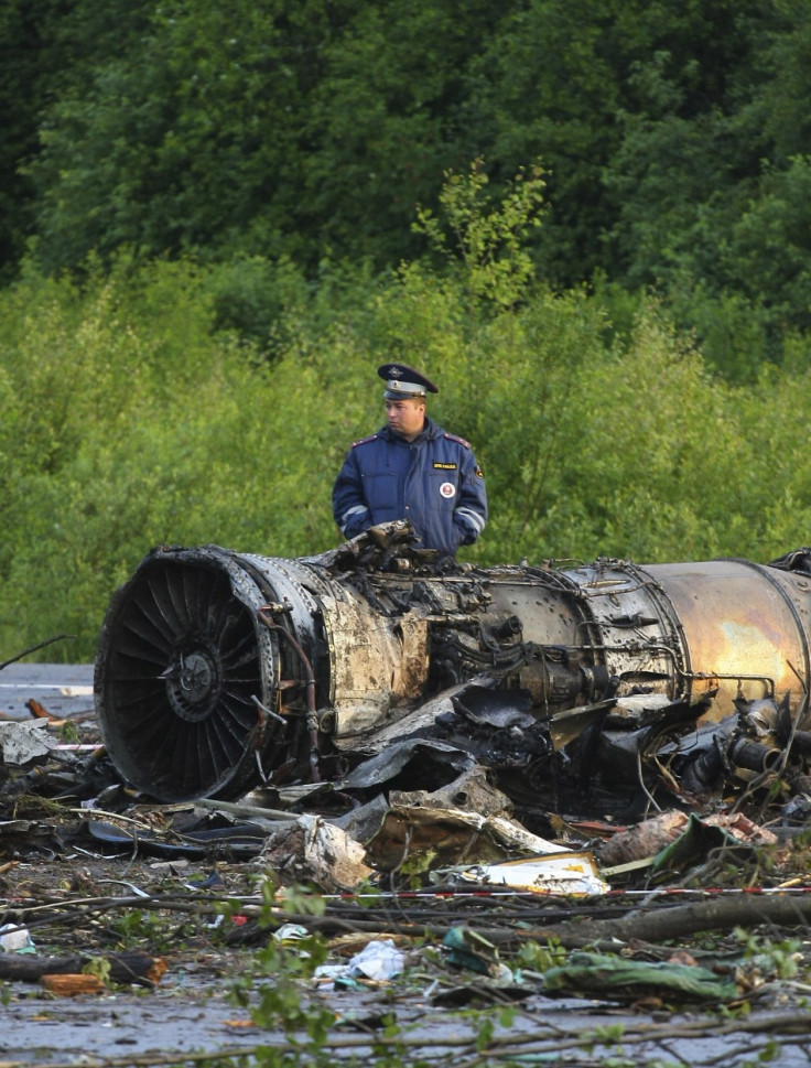 Policeman stands at the site of a plane crash outside Petrozavodsk