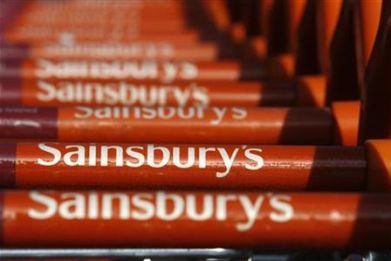 Sainsbury&#039;s shopping trolleys are lined up together outside a Sainsbury&#039;s supermarket in Brighton
