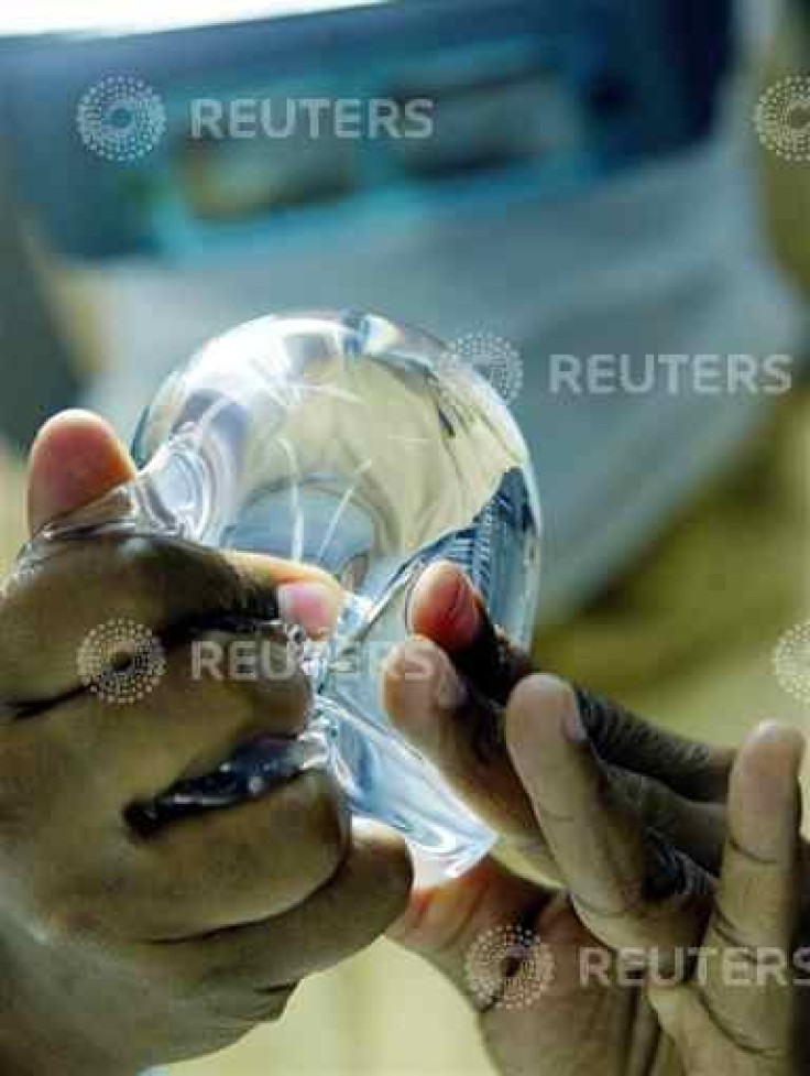A laboratory worker of Silimed factory checks silicone in Rio de Janeiro, in..