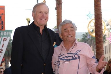 Actors Wayne Rogers (L) and Peter Falk attend the unveiling of Rogers&#039; star on the Hollywood Walk of Fame in Hollywood December 13, 2005.
