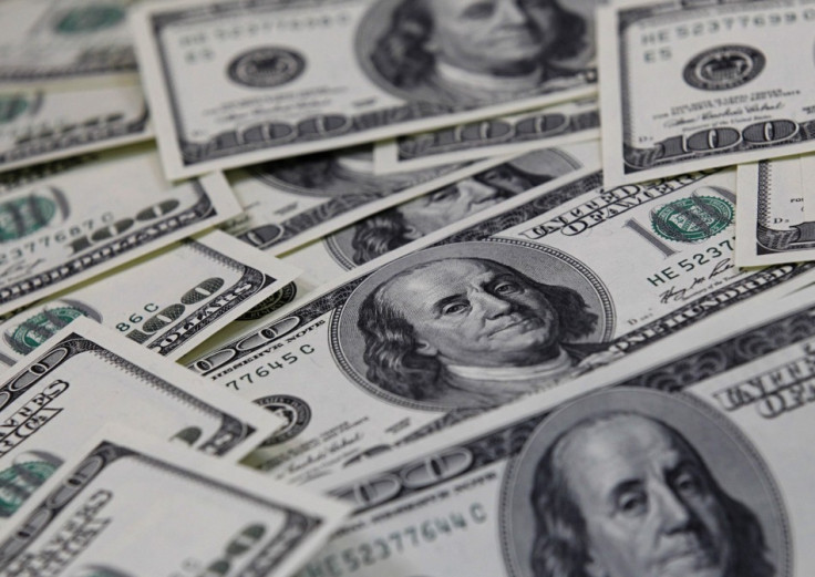 U.S. one hundred dollar notes are seen in this picture illustration taken in Seoul U.S. one hundred dollar notes are seen in this picture illustration taken in Seoul