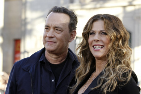 Director and cast member Tom Hanks and his wife and cast member Rita Wilson pose at the world premiere of "Larry Crowne" at the Chinese theatre in Hollywood