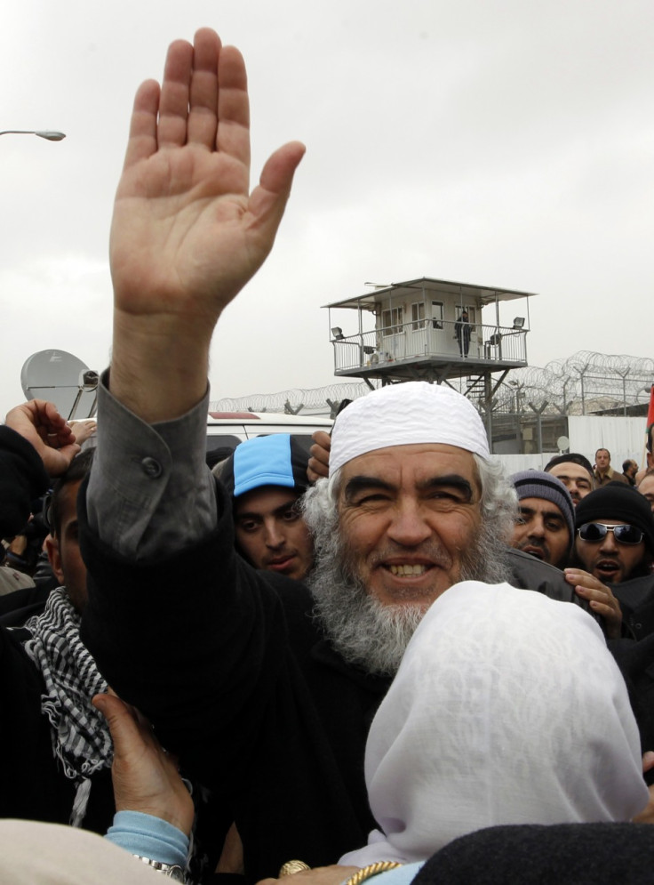 Sheikh Raed Salah gestures as he leaves prison in Ramle