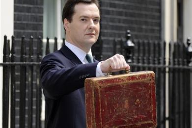Britain&#039;s Chancellor of the Exchequer, George Osborne, holds Gladstone&#039;s old Budget box for the cameras outside 11 Downing Street