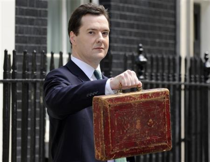 Britain&#039;s Chancellor of the Exchequer, George Osborne, holds Gladstone&#039;s old Budget box for the cameras outside 11 Downing Street