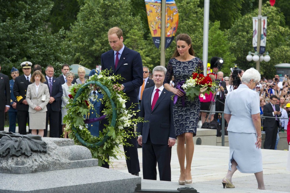 Britains Prince William and his wife Catherine, Duchess of Cambridge visit the National War Memorial in Ottawa