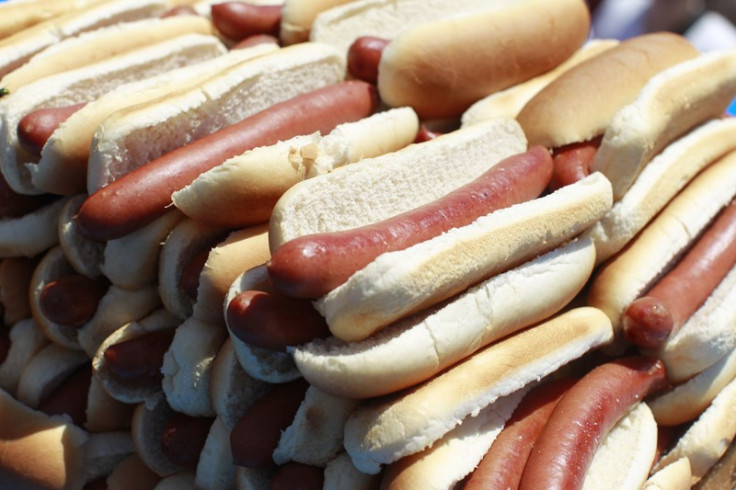 Hot dogs are stacked up before the start of Nathan&#039;s annual hot dog eating contest in the Coney Island section of New York