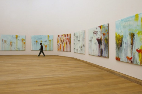 A man walks past the paintings of U.S. artist Cy Twombly in the new Museum Brandhorst modern art museum in Munich