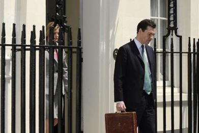 Chancellor George Osborne holds Gladstone&#039;s old Budget box outside 11 Downing Street