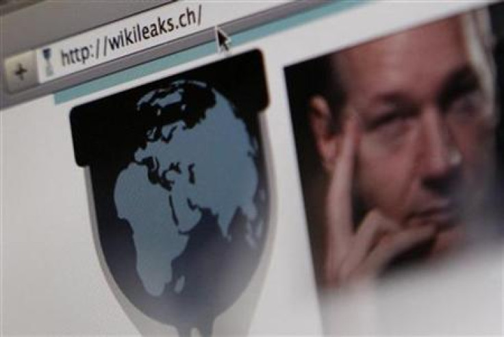 A screen shot of a web browser displaying the WikiLeaks website with a picture of its founder Julian Assange in Bern