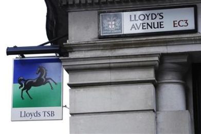 A sign for LloydsTSB bank hangs on the corner of Lloyd&#039;s Avenue in the City of London