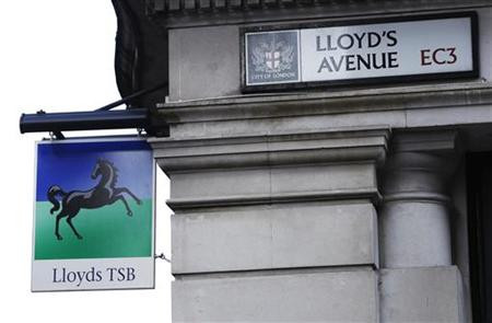 A sign for LloydsTSB bank hangs on the corner of Lloyd's Avenue in the City of London