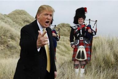 U.S. property mogul Trump gestures during a media event on the sand dunes of the Menie estate