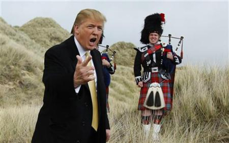 U.S. property mogul Trump gestures during a media event on the sand dunes of the Menie estate