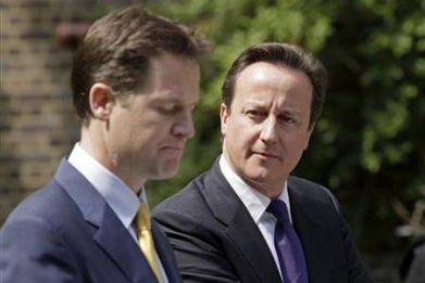 Britain&#039;s Prime Minister Cameron and Deputy Prime Minister Clegg hold their first joint news conference in London