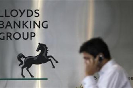A pedestrian passes the head office of the Lloyds Banking Group in London