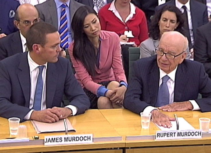 James and Rupert Murdoch appear before a parliamentary committee at Portcullis House in London