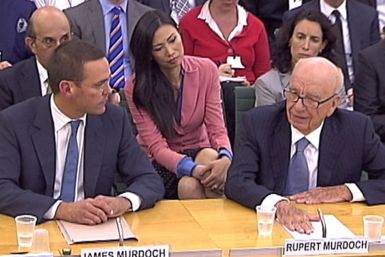 James Murdoch and Rupert Murdoch appear before a parliamentary committee