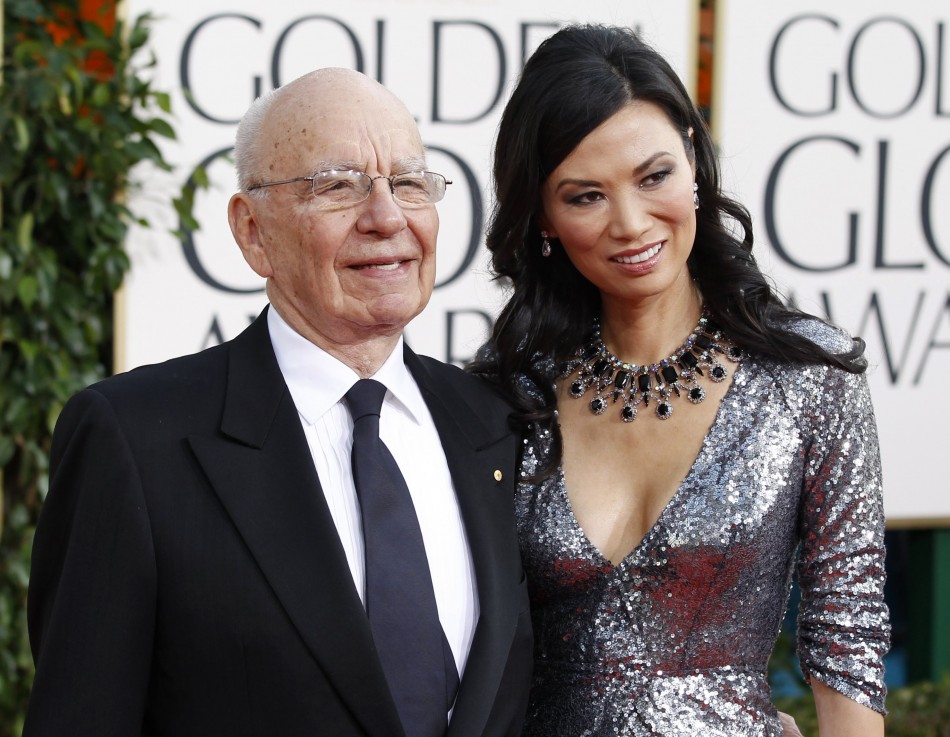 News Corp Chief Executive Rupert Murdoch and his wife arrive at the 68th annual Golden Globe Awards in Beverly Hills