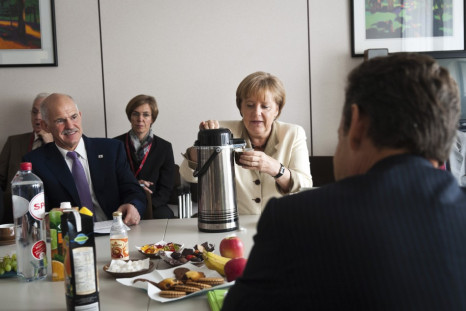 German Chancellor Merkel Greek Prime Minister Papandreou and French President Sarkozy attend a meeting in Brussels
