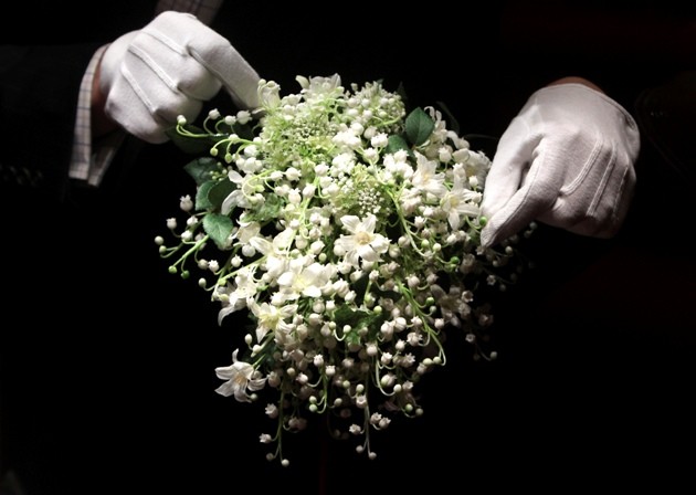 A recreation of the wedding bouquet of Britains Catherine, Duchess of Cambridge is seen as it is prepared for display at Buckingham Palace in London