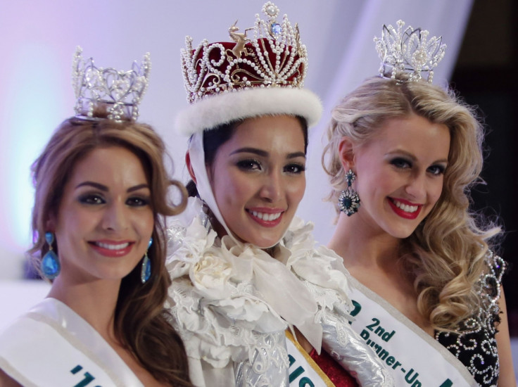 Newly crowned Miss International 2013 Bea Rose Santiago of the Philippines (C), first runner-up Miss Netherlands Nathalie den Dekker (L) and second runner-up Miss New Zealand Casey Radley.