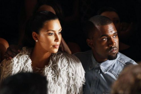 Kardashian is reportedly planning to gift her fiance Kanye West an album full of racy picturess of her