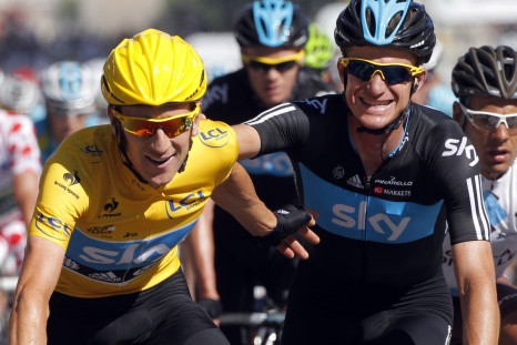 Michael Rogers congratulates team mate Bradley Wiggins on his victory in final stage of Tour de France