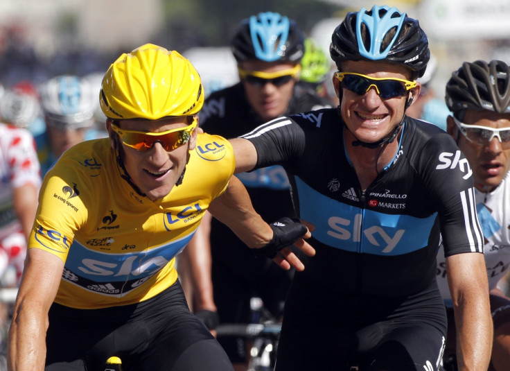 Michael Rogers congratulates team mate Bradley Wiggins on his victory in final stage of Tour de France