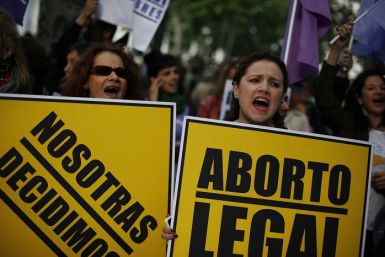 Demonstrators shout slogans during a pro-choice protest against Spain's anti-abortion draft bill.