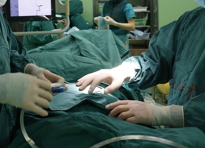 Surgeon suspended in Birmingham after initials found branded on liver