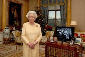 Queen Elizabeth poses as she records one of her earlier Christmas broadcast