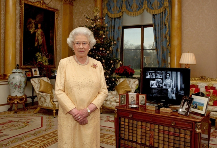 Queen Elizabeth poses as she records one of her earlier Christmas broadcast