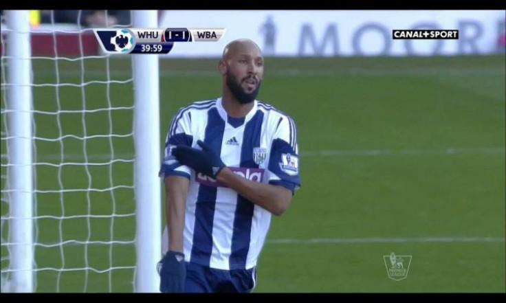 Anelka performs the controversial 'quenelle' gesture after scoring against West Ham on December 28, 2013. (Canal Plus Sport)