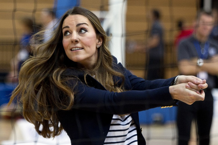 Catherine, Duchess of Cambridge, plays volleyball as she attends a SportsAid athlete workshop at the Copper Box in the Olympic Park in London