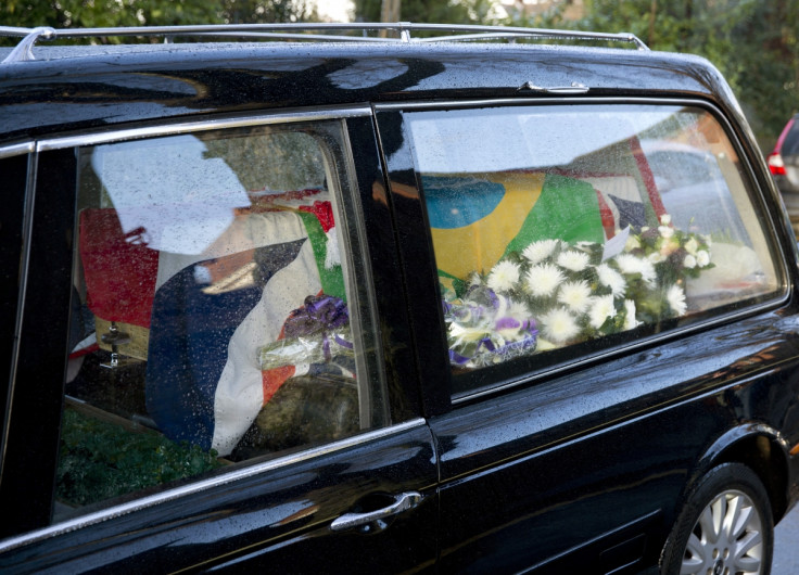 Coffin of Ronnie Biggs arrives draped in Brazilian and British flags at  Golders Green cemetery