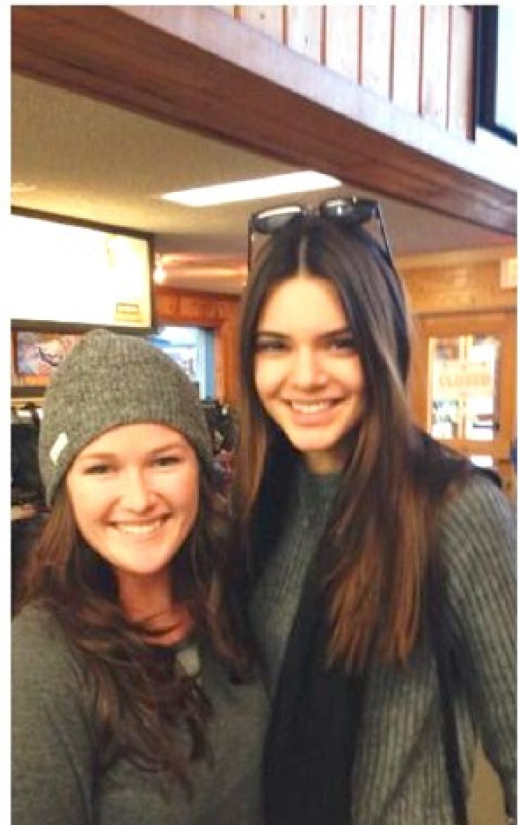 Kendall Jenner Poses with a Fan
