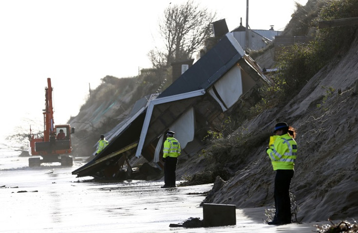 Collapsed houses following a storm surge in Hemsby, eastern England.