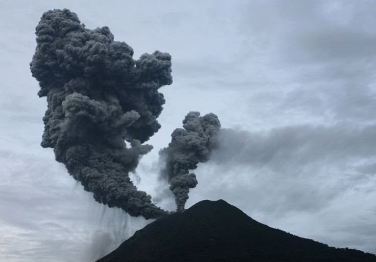 Mount Sinabung emits billowing clouds of smoke over Suka Nalu village in Indonesia's North Sumatra province.