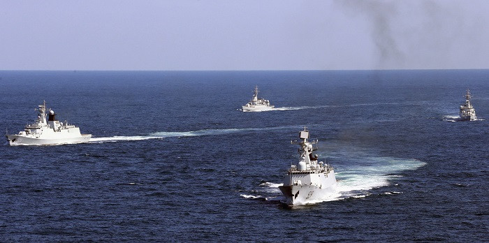 Chinese vessels patrol the East China Sea during a joint navy drill involving eight planes and over 1,000 military personnel. Chinese vessels patrol the East China Sea during a joint navy drill involving eight planes and over 1,000 military personnel.